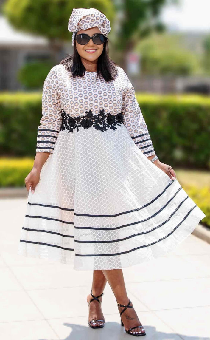 White lace midi dress with dark striped trim, 3/4 sleeves