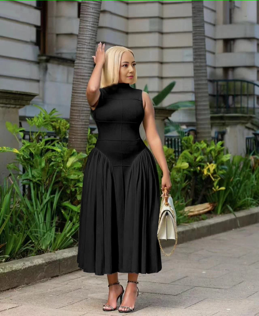 Black pleated midi A-line dress with sleeveless fitted bodice and pleated skirt