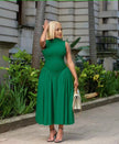 Green pleated midi A-line dress with sleeveless fitted bodice and pleated skirt