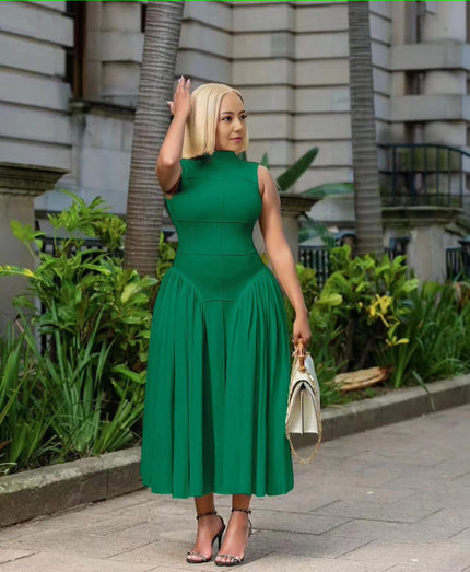 Green pleated midi A-line dress with sleeveless fitted bodice and pleated skirt