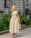 Khaki pleated midi A-line dress with sleeveless fitted bodice and pleated skirt