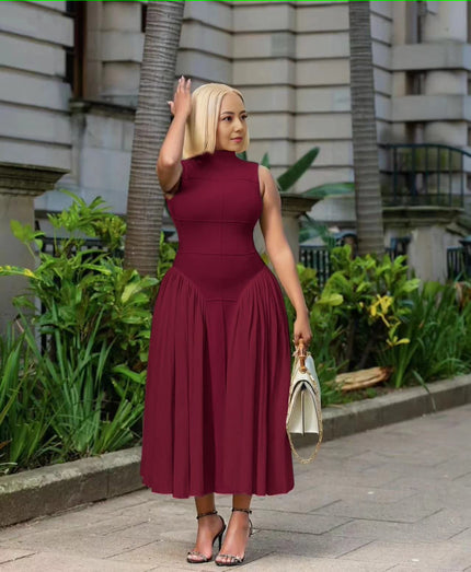 Maroon pleated midi A-line dress with sleeveless fitted bodice and pleated skirt