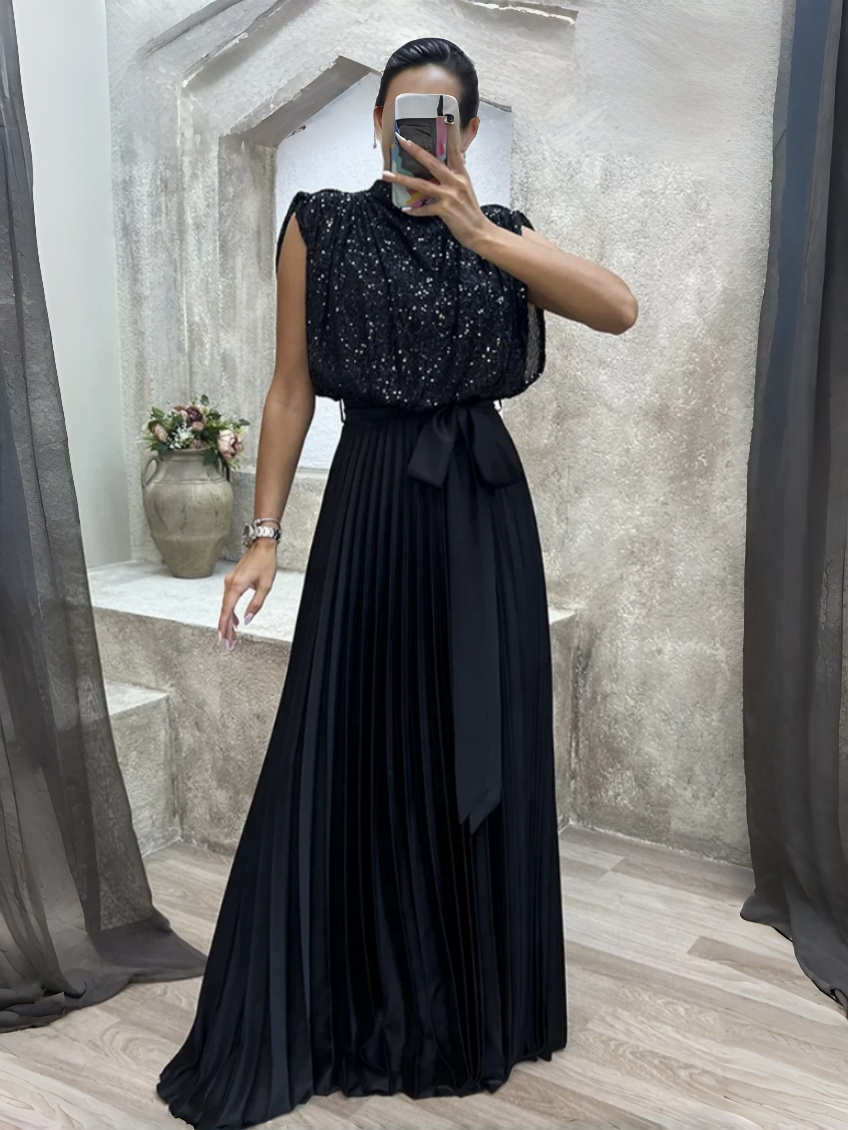 Black sequin pleated maxi dress, high neck, sleeveless, with waist bow