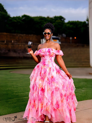 Off-shoulder ruched maxi dress with watercolor floral print and ruffle tiers