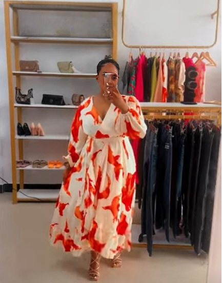 Abstract midi dress with red-and-white print, tie waist, puff sleeves, flowing skirt