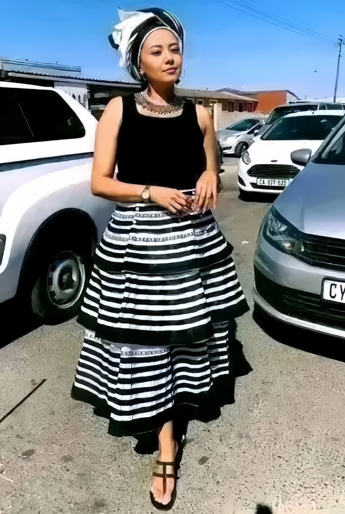 Tiered striped skirt with adjustable fit, black and white layered ruffles