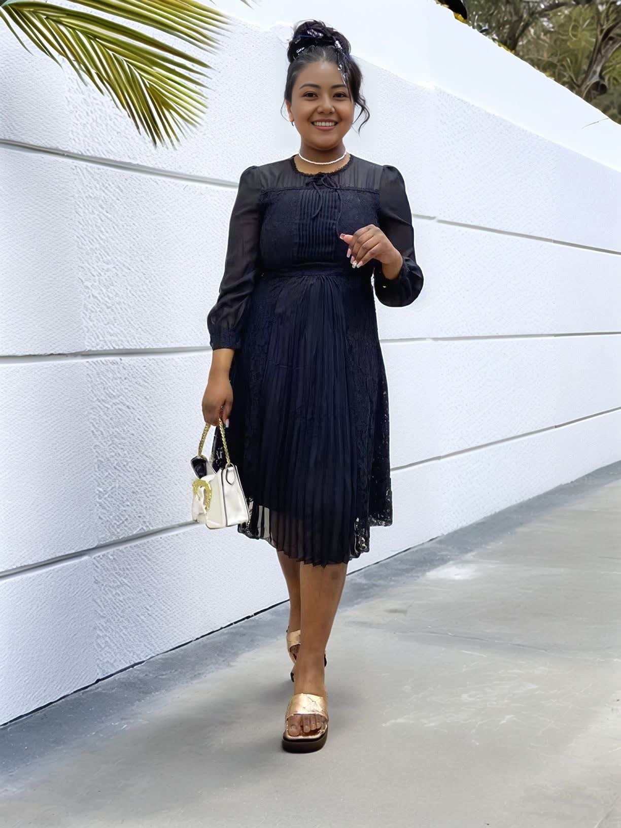 Black midi lace pleated dress with bow neck detail and long sleeves