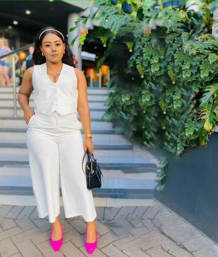 White wide-leg trouser set with sleeveless button-front V-neck top