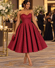 Strapless red chevron-beaded midi evening dress with a sweetheart neckline and full skirt