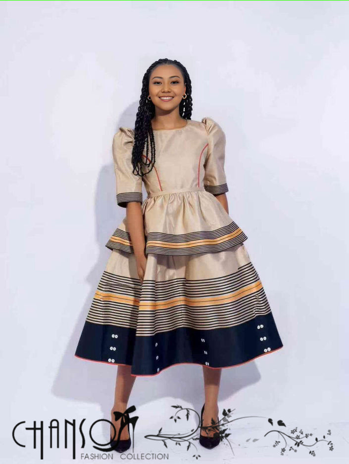 Heritage midi dress with puff sleeves, striped tiered skirt, navy and beige tones