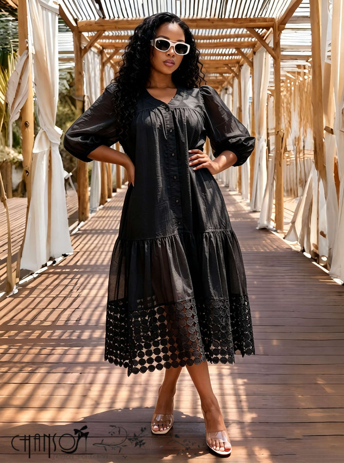 Black midi shirt dress with puff three-quarter sleeves and lace cutout hem