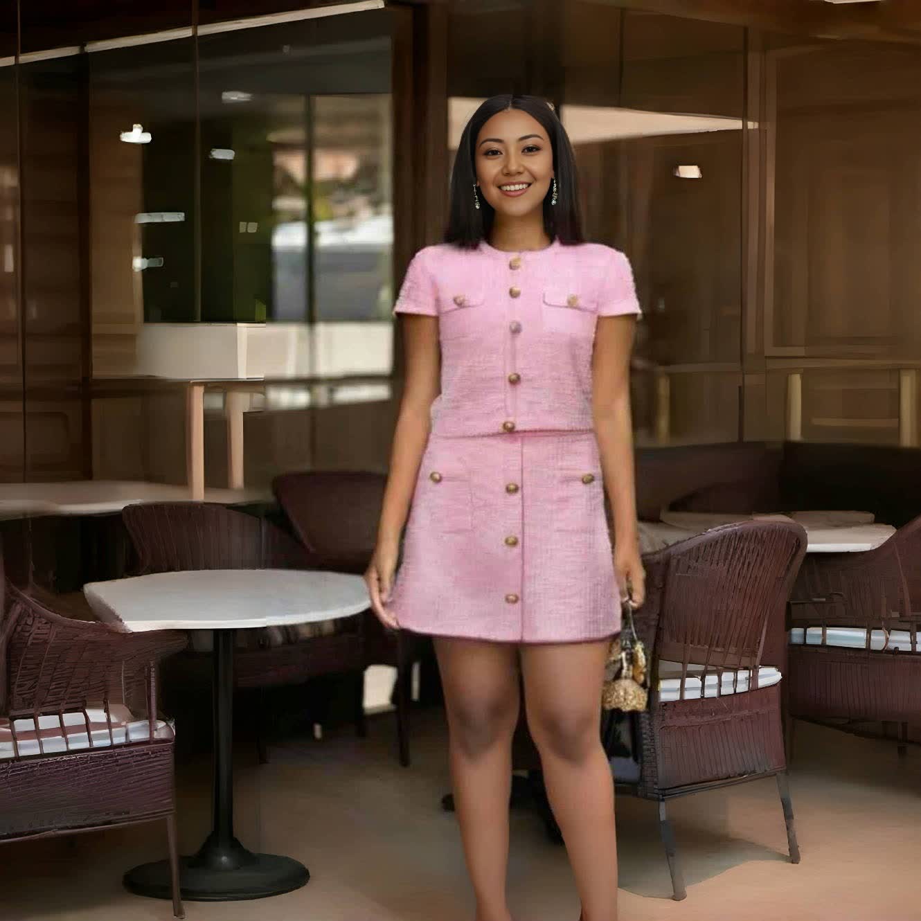 Pink button-front mini dress with gold-tone buttons and cap sleeves