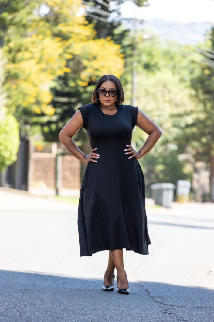 Black sleeveless A-line midi dress with flared skirt
