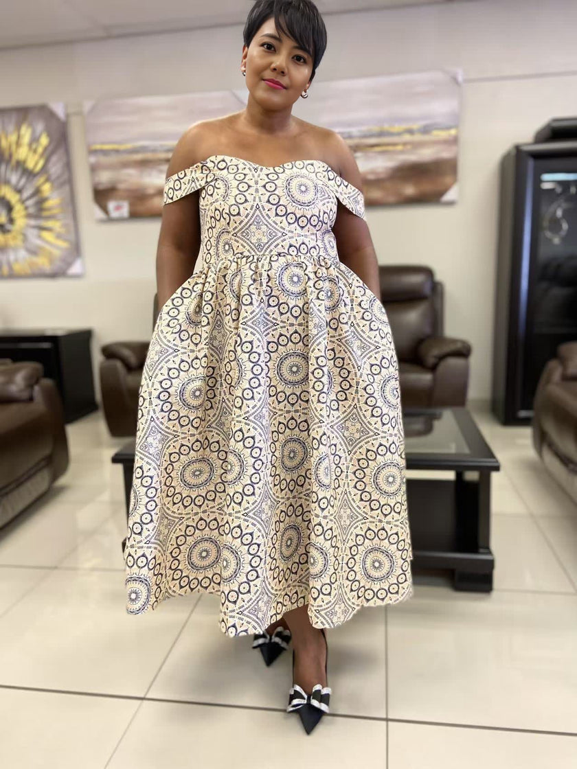 Ethnic Style Off-Shoulder Dress featuring Geometric Patterns and Loose Hem