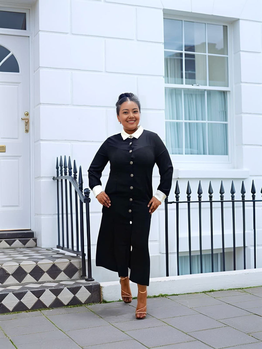 Black midi dress with white contrast collar and button front, long sleeves