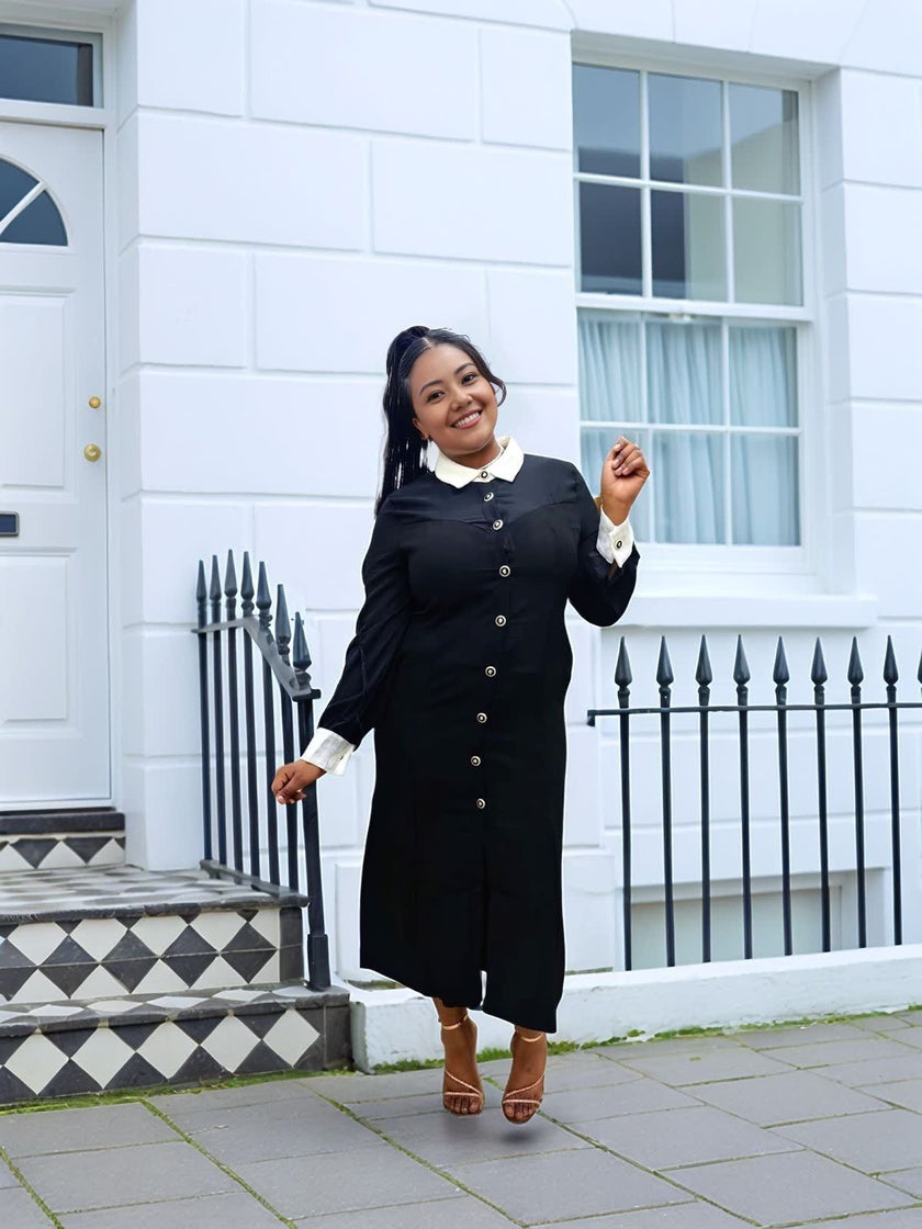 Black midi dress with white contrast collar and button front, long sleeves at side