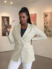 Double-breasted blazer with lapel and front pocket accents