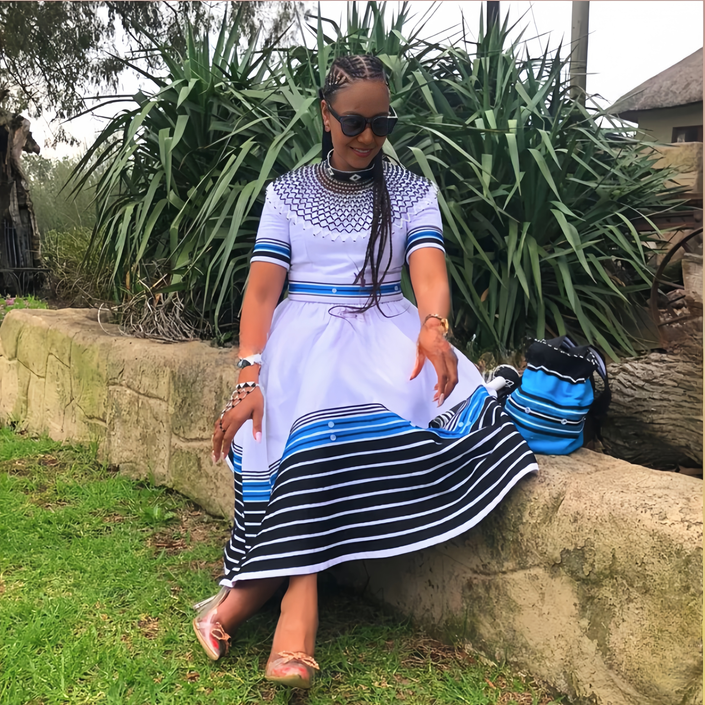 Cinched waist midi dress with striped hem, short sleeves, blue and white