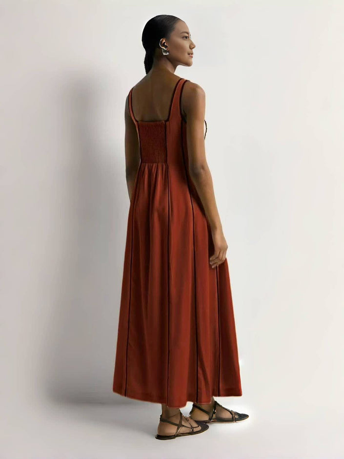 Rust brown sleeveless square-neck maxi dress with gathered skirt and seam paneling