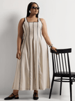 Cream striped sleeveless maxi dress with square neckline, gathered skirt pleats
