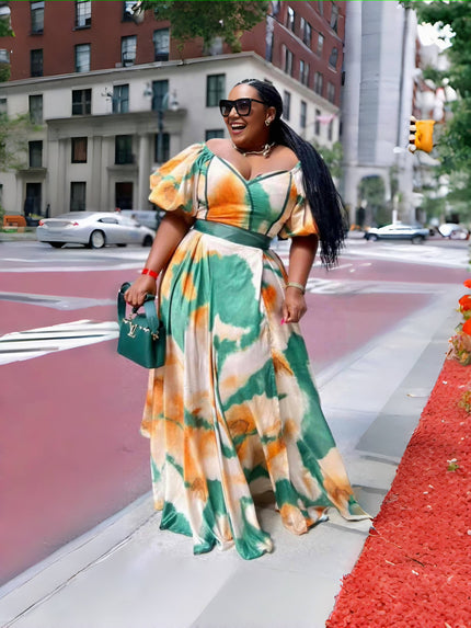 Abstract print maxi dress with puff sleeves, square neckline, and cinched waist