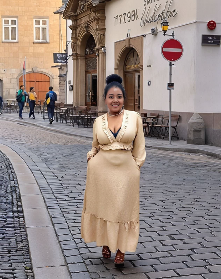 Nude ruffle maxi dress with V-neck and long sleeves, tiered skirt hem