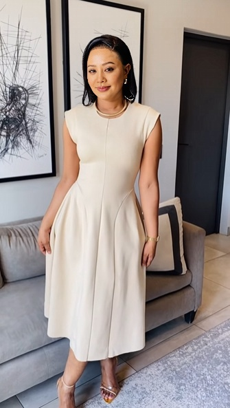 Cream sleeveless A-line midi dress with round neckline