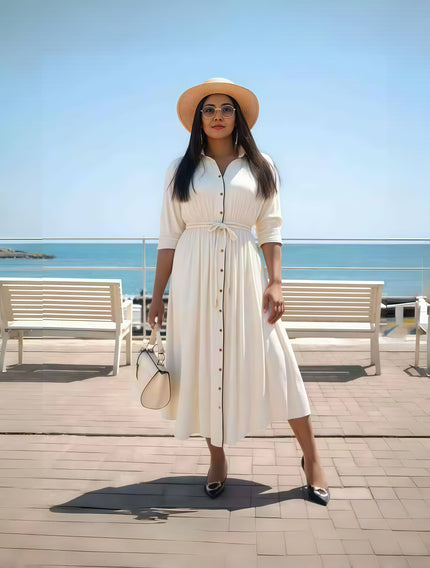 Beige tie-waist button-front midi dress with long sleeves and collared neckline