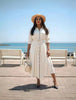 Cream midi dress with tie waist and button-front, long sleeves