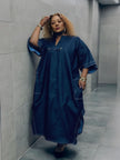 Loose-Fit Long Traditional Coat with White Stitch Trim and Wide Sleeves
