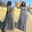 Zigzag maxi dress with V-neck, short sleeves, flared hem; black-and-white pattern