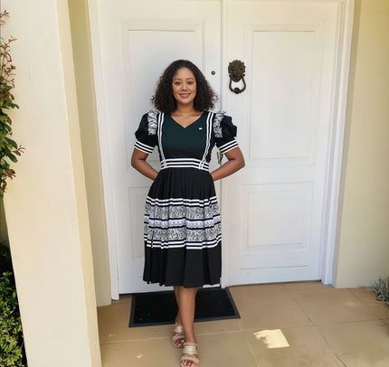 Embroidered midi dress with puff sleeves, V-neck, black with white tiered embroidery