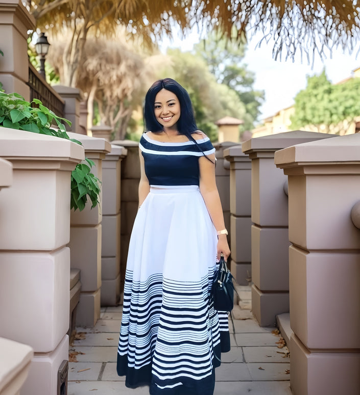 Off-shoulder A-line maxi dress, navy-and-white striped bodice and skirt
