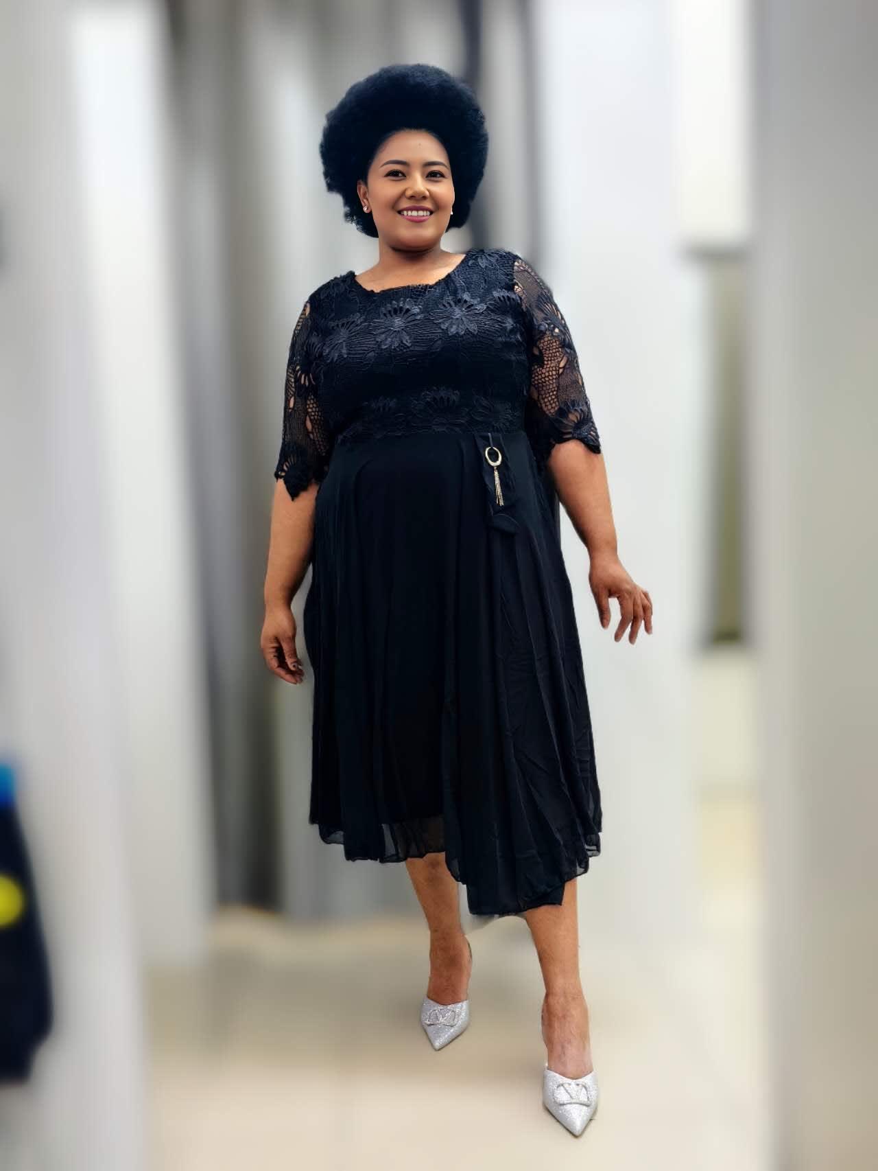 Lace midi dress with dark lace sleeves, waist ring detail, pleated skirt