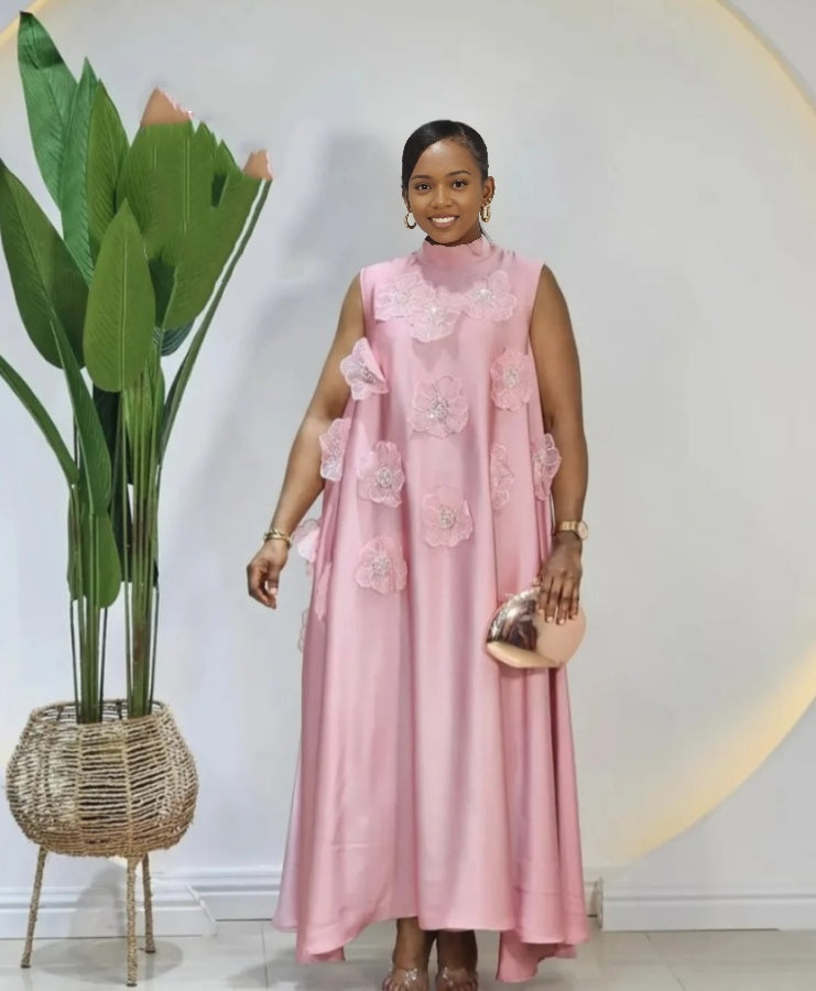 Pink sleeveless floral appliqué maxi dress with layered bodice detail