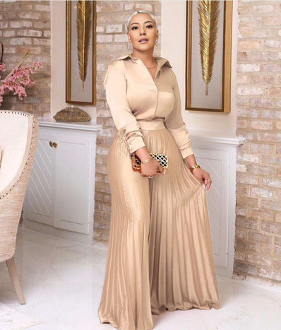 Beige pleated skirt twin set with long-sleeve buttoned top, elastic waist