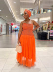 Vibrant orange traditional women's two piece set with matching headwrap