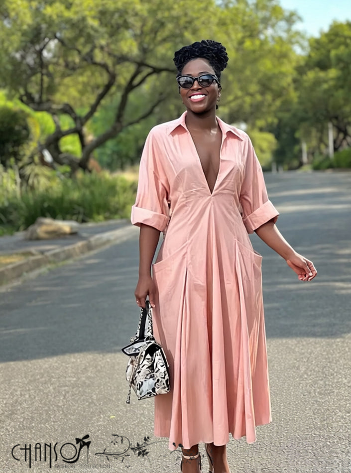 Pink maxi shirt dress with V-neck, short sleeves, and side pockets