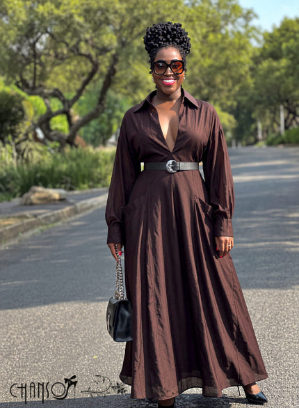 Brown maxi shirt dress with V-neck, long sleeves, and side pockets