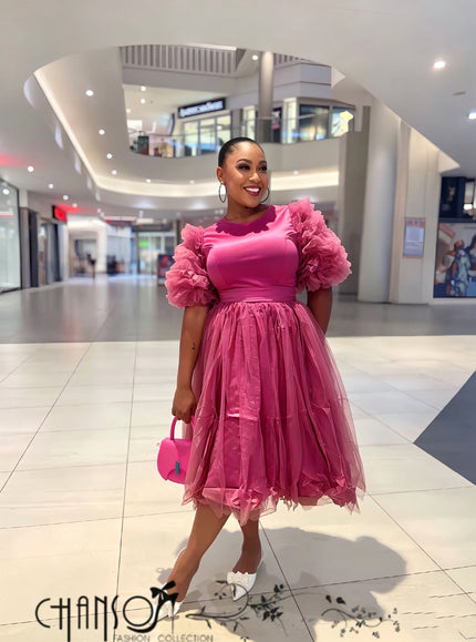Women’s hot pink midi dress with ruffle sleeves, waist tie, and layered tulle skirt