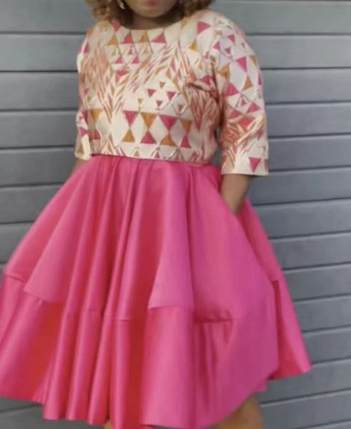 Girls printed blouse and pleated skirt twin set, beige and pink geometric top