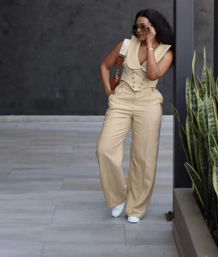 Beige sleeveless V-neck button-front wide-leg jumpsuit with tailored bodice.