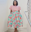 Floral A-line skirt and pink puff-sleeve top set with gathered waist