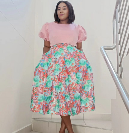 Pink puff-sleeve top with floral A-line skirt set
