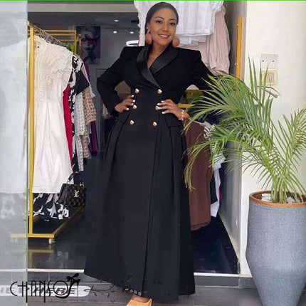 Black maxi blazer dress, double-breasted with gold buttons and tailored pleats