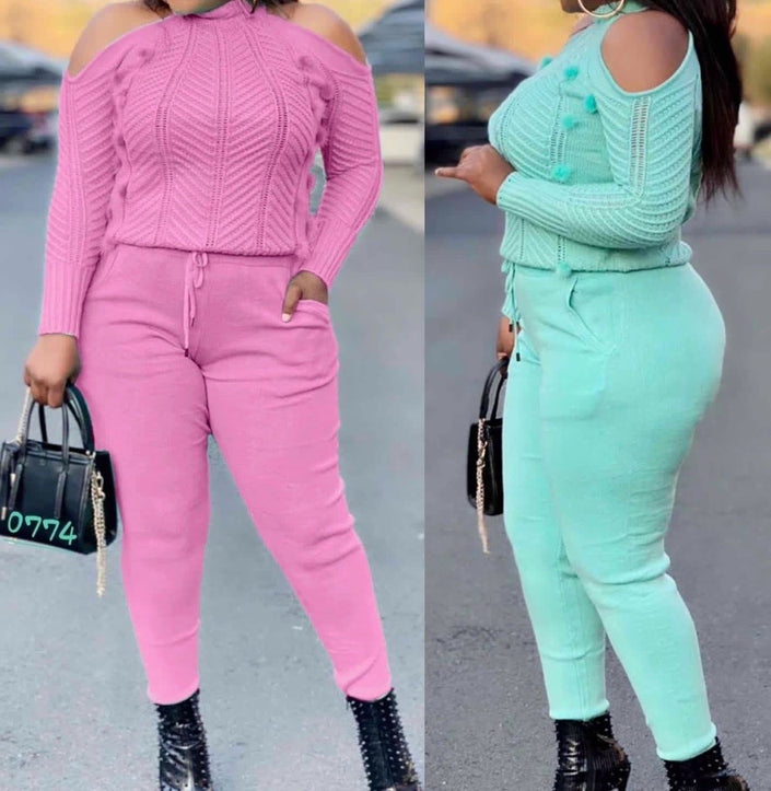 Off-shoulder knit top and high-waist pants in pink and aquamarine, long sleeves