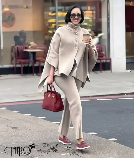 Beige knitted twin set cape with high neck, button front and matching pants