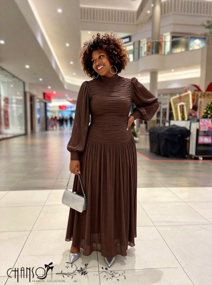 Brown ruched high-neck maxi dress with sheer sleeves and gathered tiered skirt