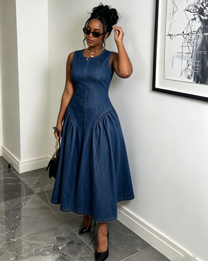 Dark blue sleeveless denim midi dress, fitted waist and flared skirt