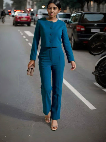 Blue button-front top paired with straight-leg pants, full-length view